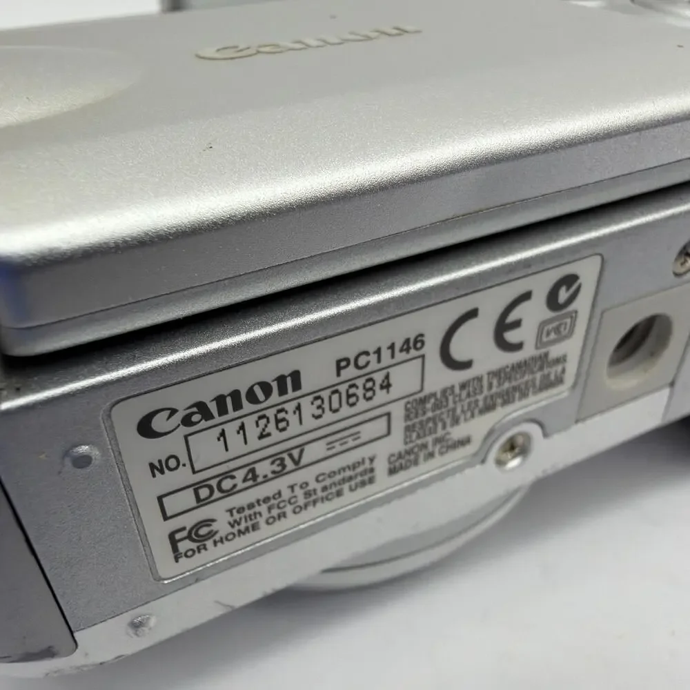 Canon PowerShot A610 PC1146 5.0MP Silver Digital Camera For Parts Repair